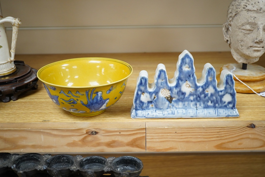 A Chinese blue and white brush holder and a yellow ground bowl, 16cm diameter, Condition - good